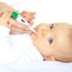 What should I do if my child’s temperature rises after vaccination?