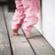 Why does a child walk on socks and what to do?