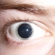 Causes of dilated pupils in a child