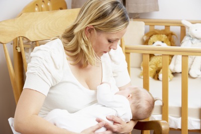 Feeding from one breast of a baby