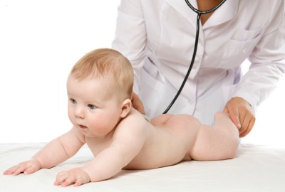 Examination of the baby by a doctor