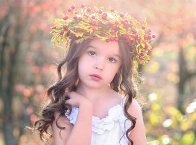 Beautiful girl with a wreath