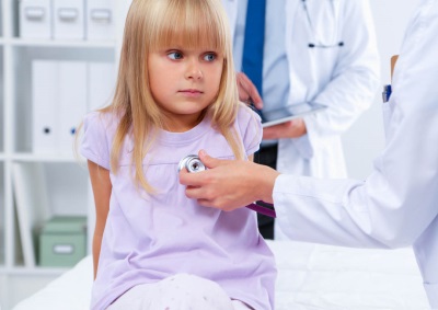 Examination of the girl by the doctor in the clinic