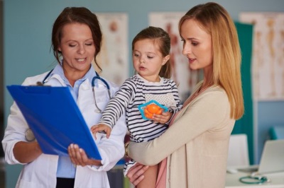 Doctor and child at the reception