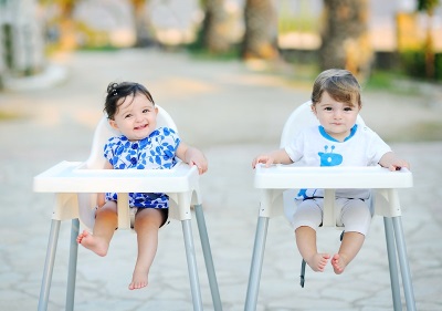 Children 11 months in chairs for feeding