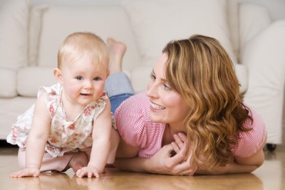 Baby crawling at 9 months with mom