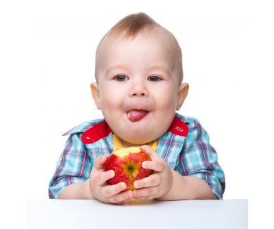 Baby eating an apple