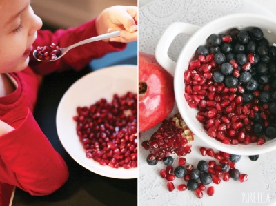 Children eat pomegranate