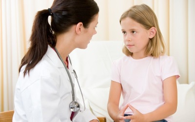 Examination of a child of 11 years at the doctor