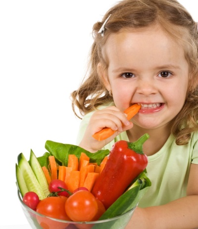 Baby eating vegetables