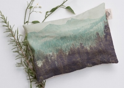 Toy-warmer pillow with herbs for a newborn